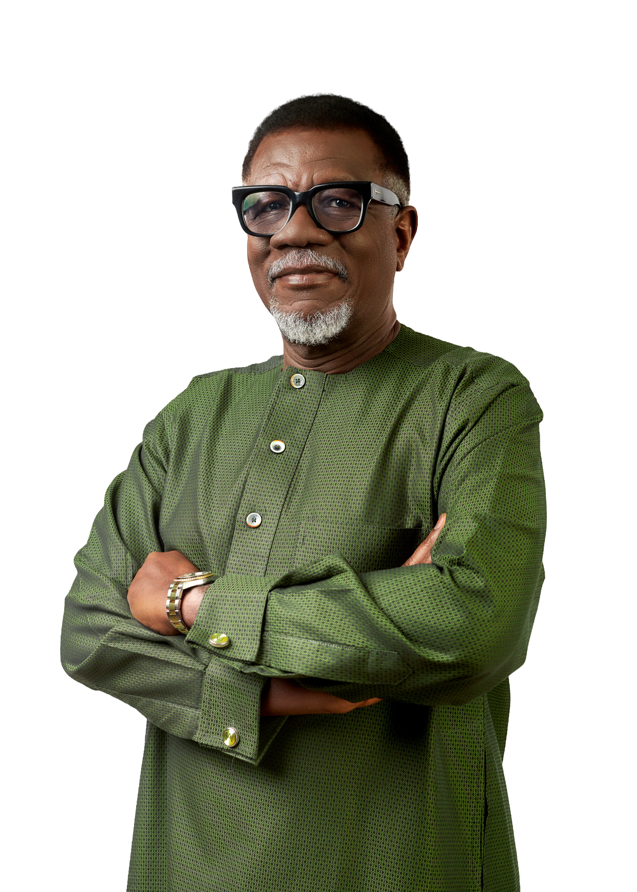 Mensa Otabil in a green tunic, arms folded, closer crop